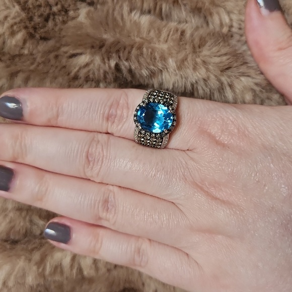 Swiss blue topaz and diamond ring